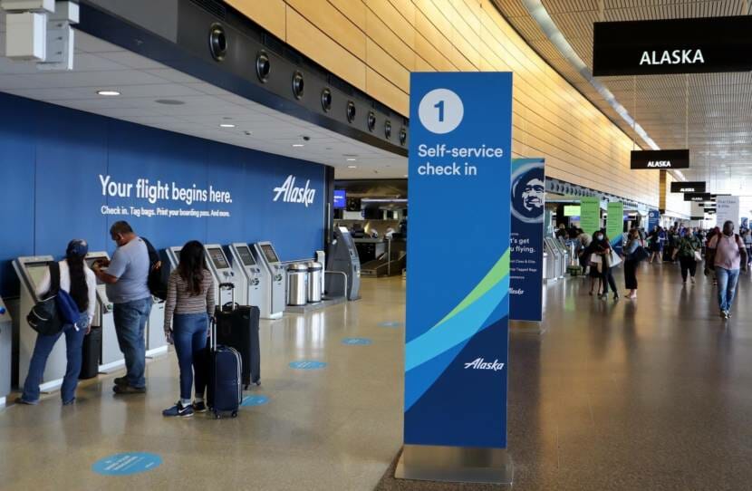 Departing passengers at Sea-Tac International Airport have lots of check-in kiosks to choose from with air traffic still way down from last year. (Photo courtesy Tom Banse/ NW News Network) TOM BANSE / NW NEWS NETWORK