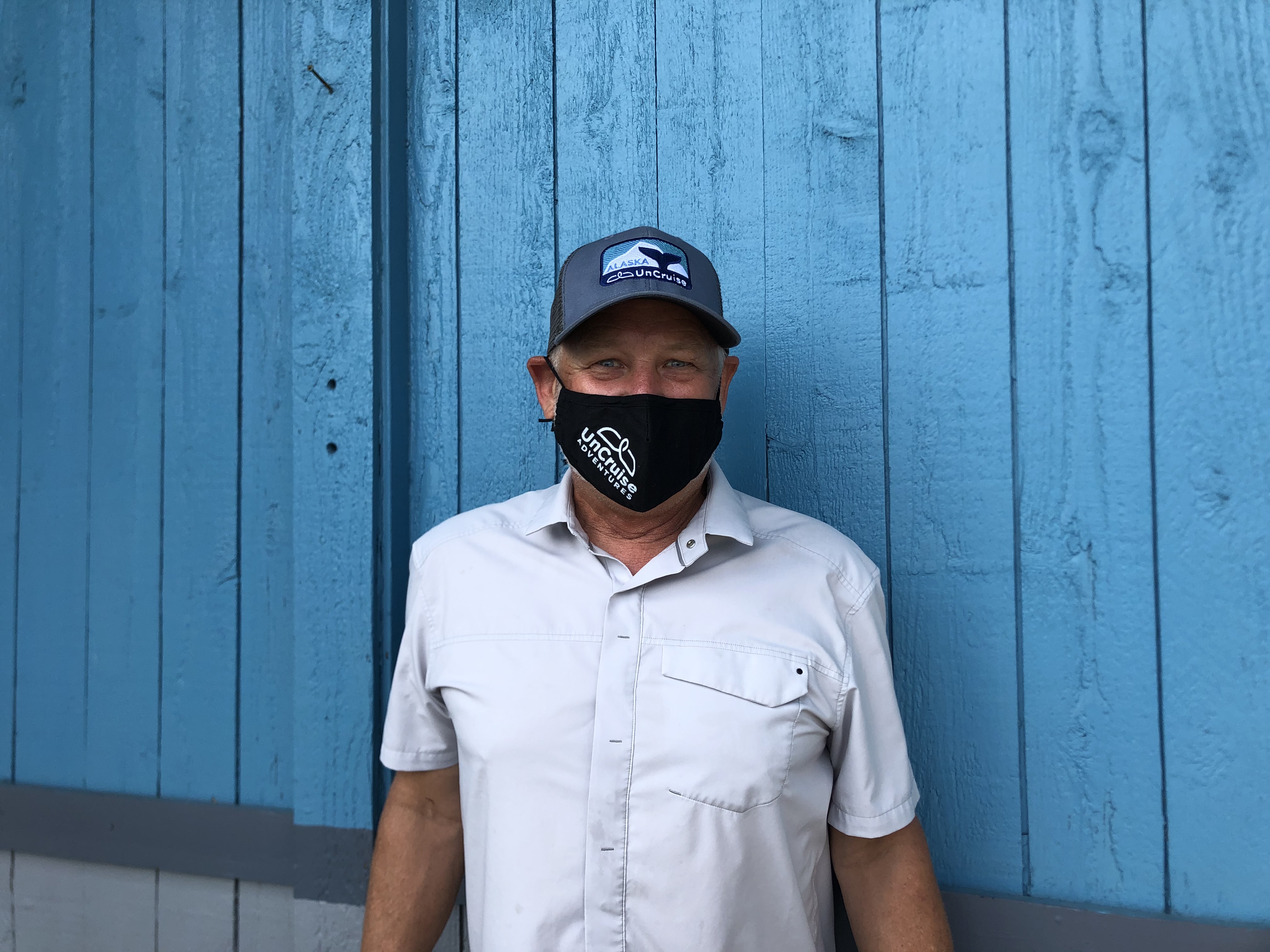 Portrait of Uncruise CEO Dan Blanchard wearing an Uncruise face mask