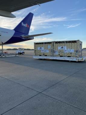 Fed Ex flew the specially-made shipping containers from Seattle to Anchorage. One bull road alone. Two others shared a container. (Photo courtesy of the Old Harbor Alliance)