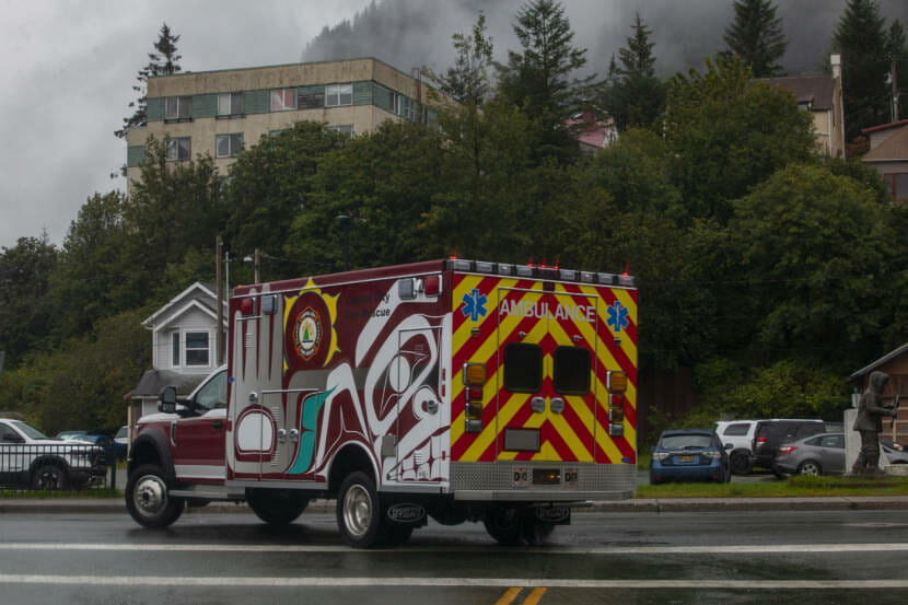 A newly refurbished ambulance decorated with art from Tlingit artists Mary Goddard and Crystal Worl drives through downtown on August 28, 2020 in Juneau, Alaska. (Photo by Rashah McChesney/KTOO)