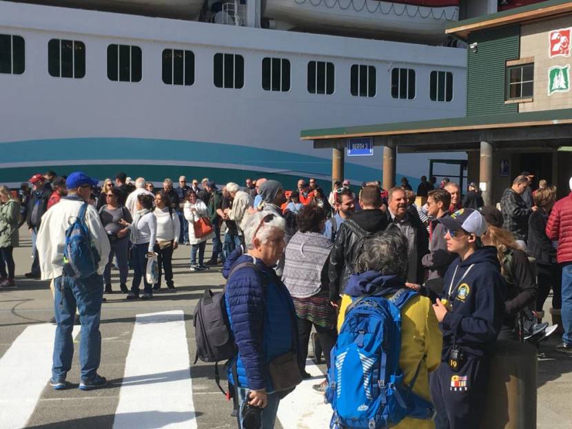 Passengers from the mega ship Norwegian Joy disembark in May 2019 at Ketchikan’s Berth 3 downtown. (Photo by Leila Kheiry/KRBD)