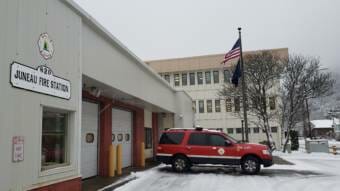 Snow falls on Capital City Fire/Rescue's downtown station in Juneau on Dec. 17, 2020.