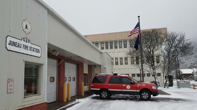 Snow falls on Capital City Fire/Rescue's downtown station in Juneau on Dec. 17, 2020.