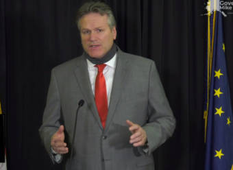 Gov. Mike Dunleavy speaks about his budget proposal, which would begin next July, during a news conference on Dec. 11, 2020. (Screen capture of video stream from the governor's office)