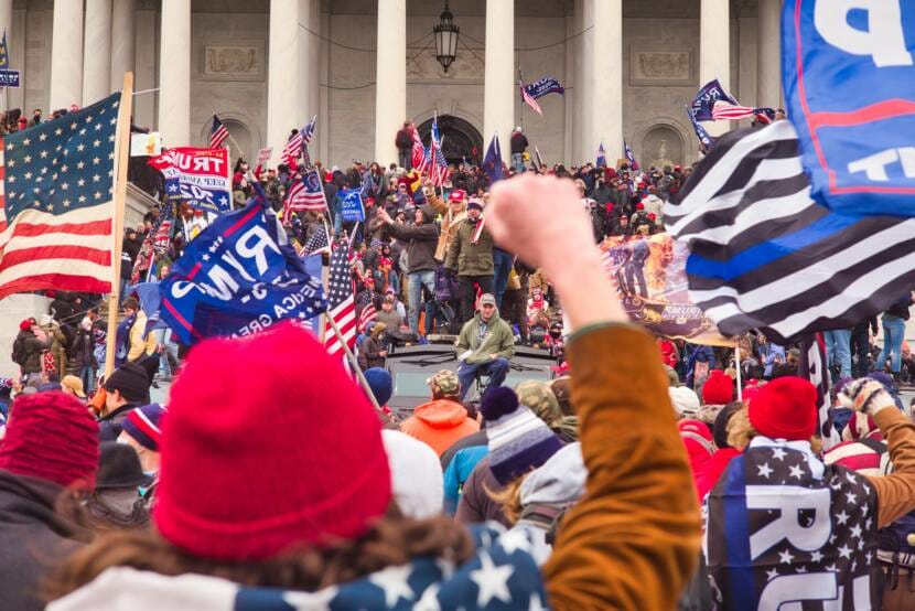 Protestors on the steps of the on Jan. 6, 2021, in Washington, D.C. (Photo courtesy Brett Davis via Flickr) 