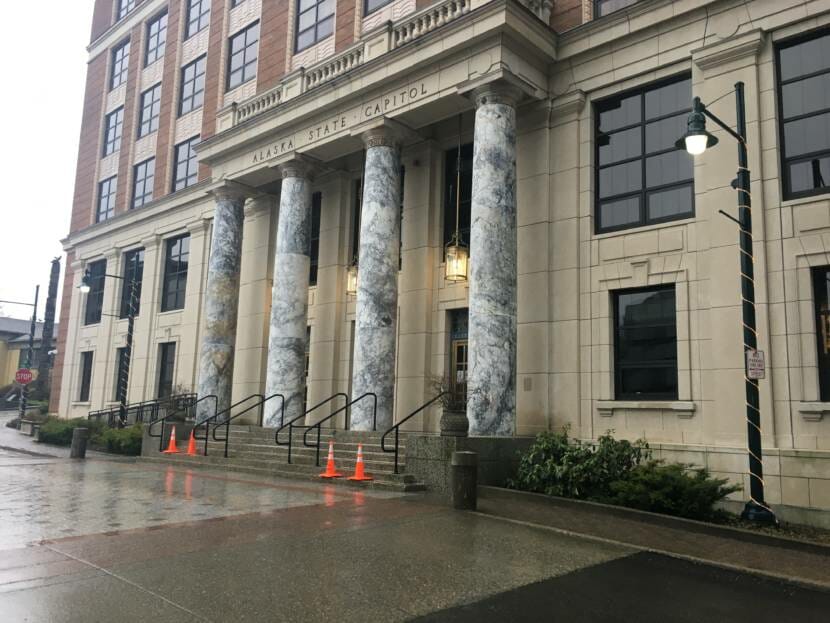 The entrance to Alaska's Capitol in Juneau on Sunday, Jan. 17, 2021. Four safety cones are at the bottom of the stairs.