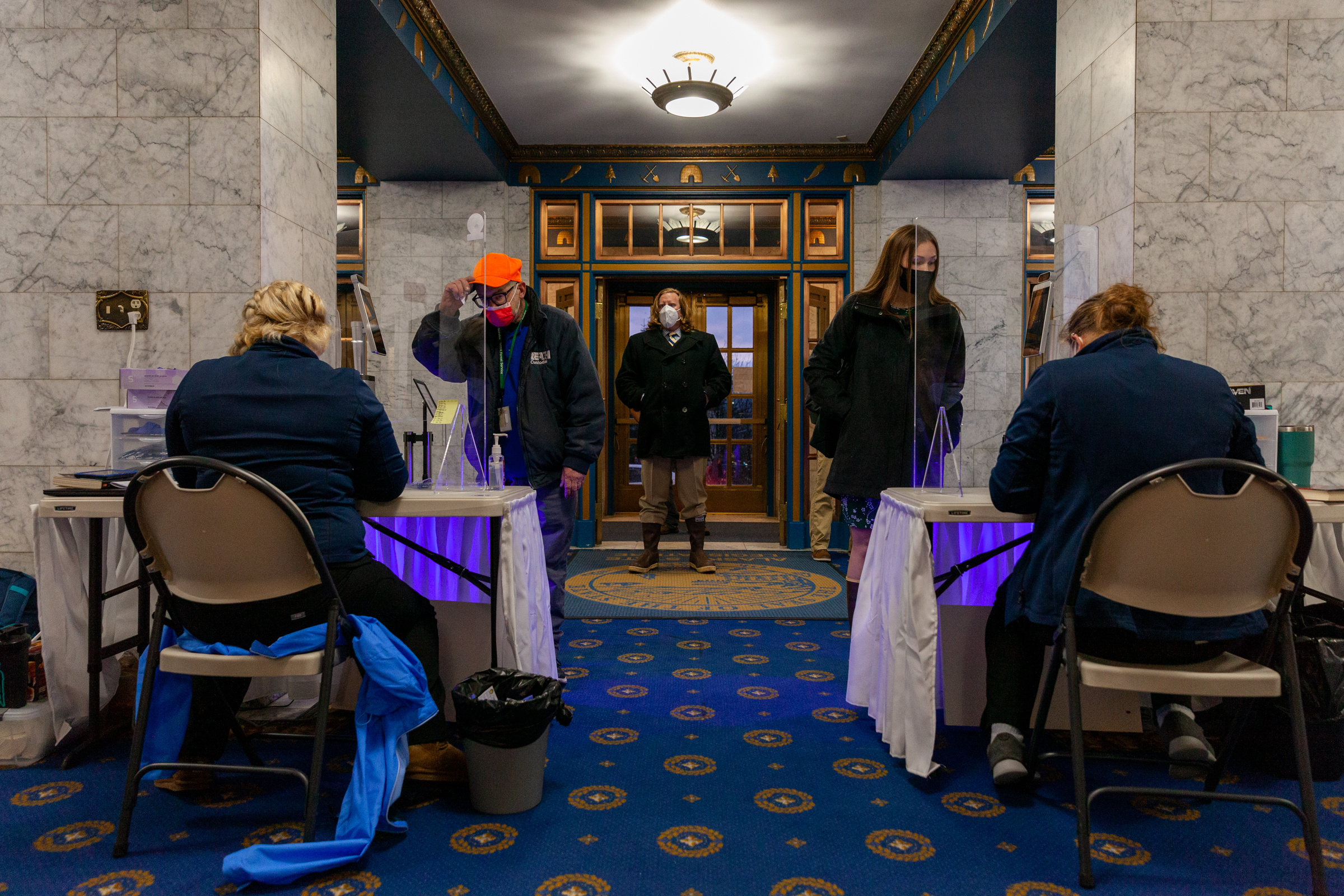 Staff of the state legislature line up for screening on Jan. 20, 2021, in Juneau, Alaska. (Photo by Rashah McChesney/KTOO)