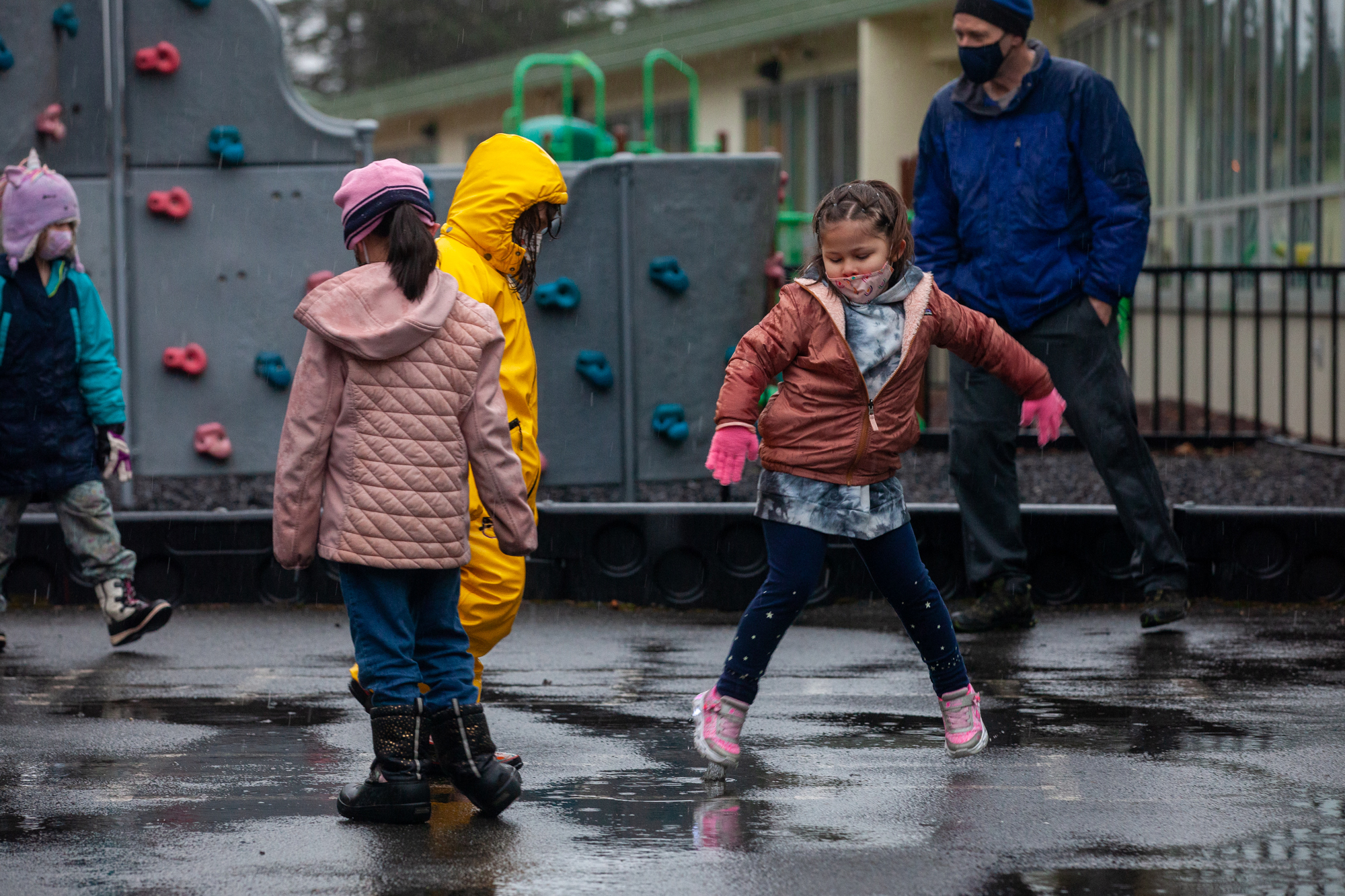 Avery Barnaby dances on the playground during her first day back to school as a first-grader at Sayéik Gastineau Community School on Thursday, Jan. 14, 2021, in Juneau, Alaska. (Photo by Rashah McChesney/KTOO)
