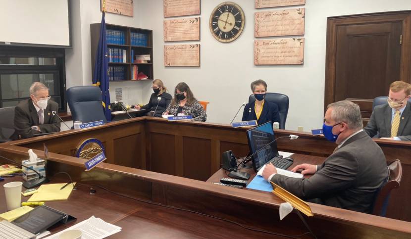 House Judiciary Committee Chair Rep. Matt Claman, D-Anchorage; an aide; Rep. Harriet Drummond, D-Anchorage; Rep. Sarah Vance, R-Homer; Attorney General Treg Taylor; and Rep. David Eastman, R-Wasilla, participate in Taylor's confirmation hearing, March, 15, 2021, in the Alaska State Capitol in Juneau. (Photo by Andrew Kitchenman/KTOO and Alaska Public Media)