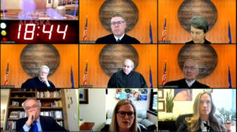 The Alaska Supreme Court listens to oral arguments in a lawsuit between Gov. Mike Dunleavy and the Legislative Council and Coalition for Education Equity on March 31, 2021. Top row: Chief Justice Joel Bolger, Associate Justice Susan Carney. Middle row: Associate Justice Peter Maassen, Associate Justice Daniel Winfree and Senior Justice Warren Matthews. Bottom row: Coalition for Education Equity lawyer Howard Trickey; Legislative Legal Services Director Megan Wallace; and Assistant Attorney General Laura Fox (Gavel Alaska screen capture)