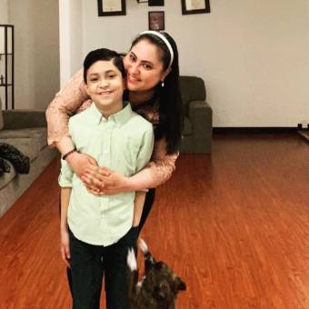 Ivette Perez hugs her 10-year-old son, Ivan. 