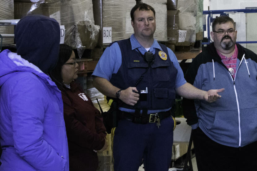 Alaska State Trooper Josh Bentz talks to people who showed up to search for Geraldine "Gerry" Nelson on May 5, 2021, at Sacred Shine in Juneau, Alaska. It has been six days since Nelson went missing from her Lemon Creek home. (Photo by Lyndsey Brollini/KTOO)