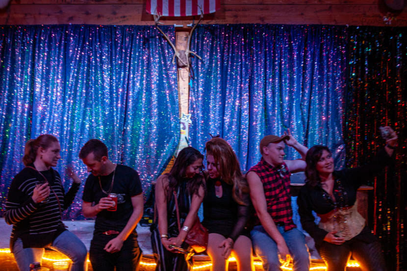 Audience members and performers gather after a drag show on Saturday, May 22, 2021, at the Red Dog Saloon in Juneau, Alaska. (Photo by Rashah McChesney/KTOO)