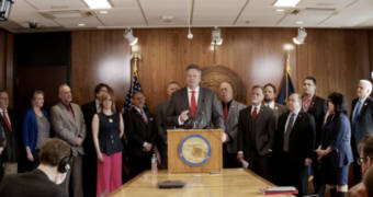 Alaska Republican Gov. Mike Dunleavy, speaking at a Capitol news conference Wednesday, introduces a new proposed constitutional amendment to restructuring the Permanent Fund. (Screenshot)