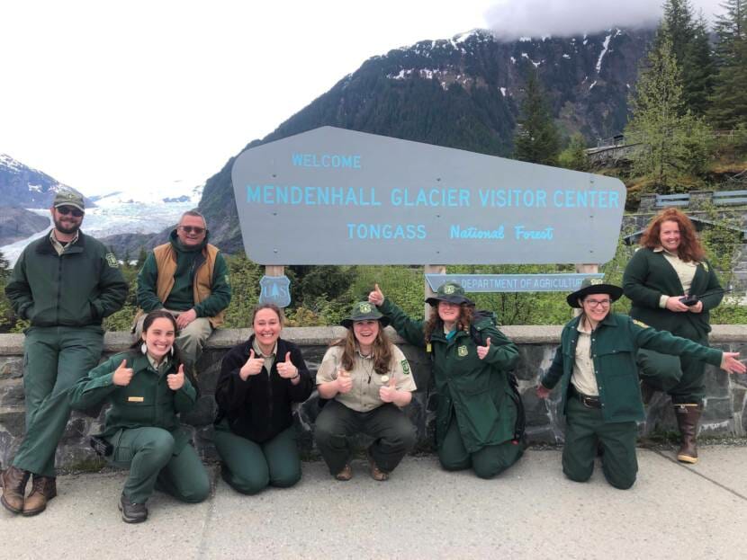 Mendenhall Glacier Visitor Center and Recreation Area staff members pose for a photo.