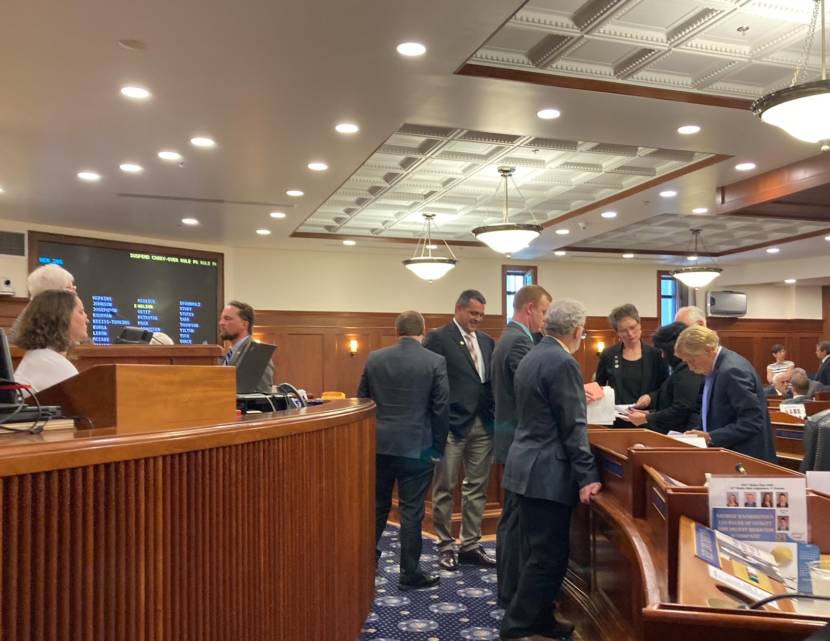 Members of the Republican House minority caucus confer during a break in the floor session on June 29, 2021, in the Alaska State Capitol in Juneau. The House voted to avert a state government shutown, but communication broke down during part of the day, delaying the vote. (Photo by Andrew Kitchenman/KTOO and Alaska Public Media) 