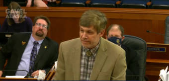 Sen. Bill Wielechowski, D-Anchorage, asks for a vote on the budget compromise during a brief technical floor session on Tuesday. Senators Robert Myers, R-North Pole, and Jesse Kiehl, D-Juneau, are behind Wielechowski. (Photo by Andrew Kitchenman/KTOO and Alaska Public Media)