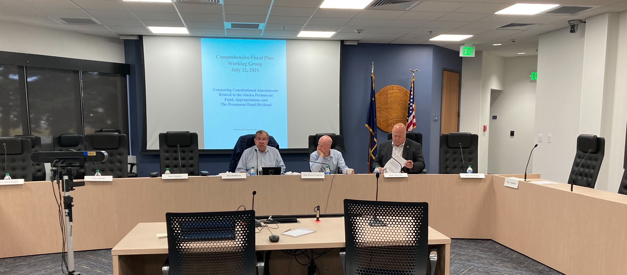 Sen. Lyman Hoffman, D-Bethel; Rep. Jonathan Kreiss-Tomkins, D-Sitka; and Rep. Kevin McCabe, R-Big Lake, attend a comprehensive fiscal plan working group meeting on July 23, 2021, at the Anchorage Legislative Information Office. (Photo by Andrew Kitchenman/KTOO and Alaska Public Media)