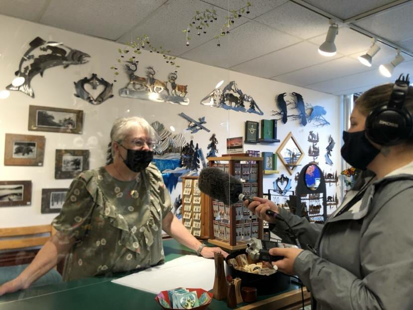 Kaysa Korpela is interviewed about business from cruise ship passengers on July 23, 2021. Korpela is an employee at The Bear's Lair, a gift shop in Juneau.