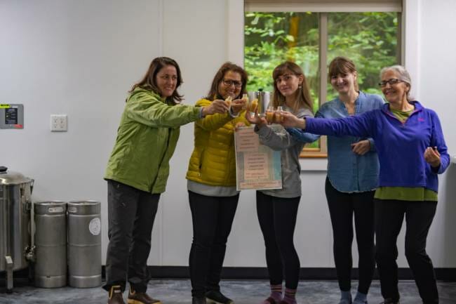 Sima Shoja (second from left) is a Juneau resident who has family in Afghanistan. She's partnering with the team at Alaska Probiotics to raise money for her loved ones overseas.