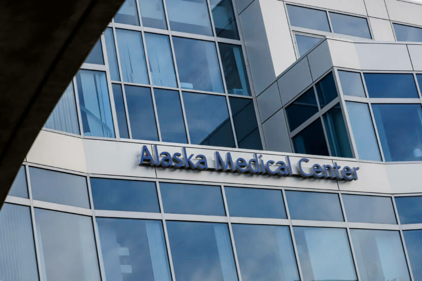 A sign on the side of a hospital building that says "Alaska Medical Center"
