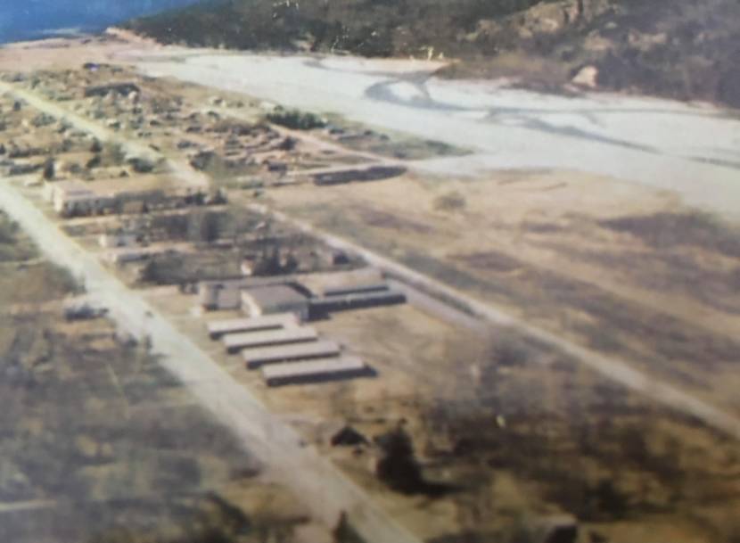 An old, blurry aerial photo of Skagway showing the Pious X Mission School