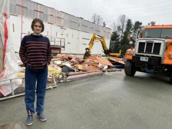 Barnacle Foods Co-Founder Lia Heifetz stands in front of a recently collapsed warehouse the company used to rent storage space in.