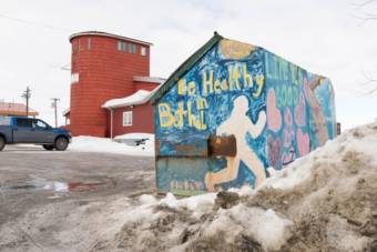 A colorful shed painted with the words "be healthy in Bethel"