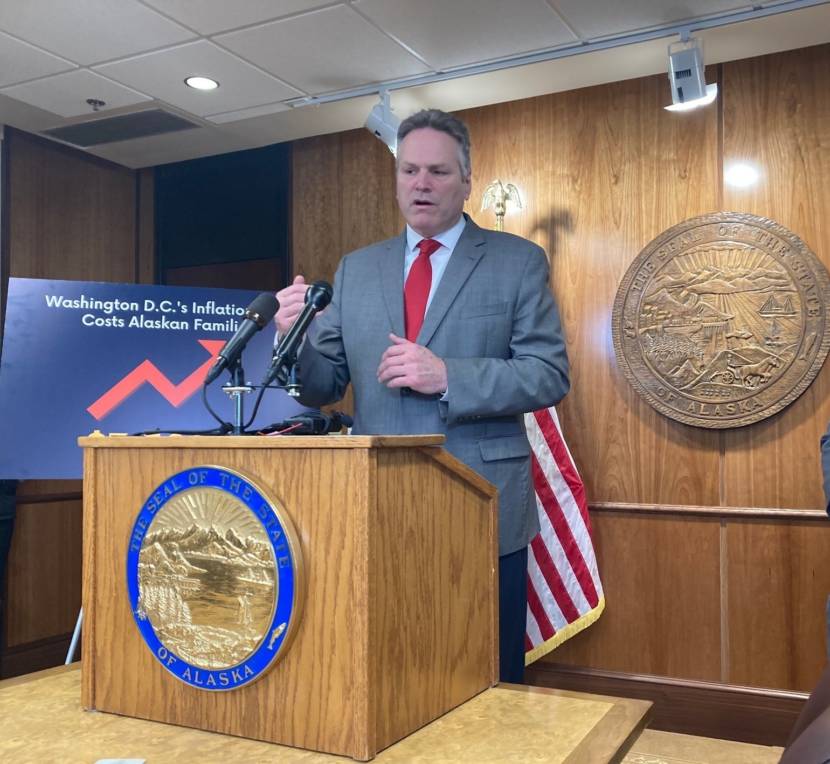 Gov. Mike Dunleavy talks about the state government's updated revenue forecast, which projects an additional $3.6 billion more than the December forecast on March 15, 2022, in the Alaska State Capitol in Juneau, Alaska. (Photo by Andrew Kitchenman/KTOO and Alaska Public Media) 