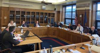 Members of the Alaska House Finance Committee discuss the proposed budget on March 16, 2022 in the Alaska State Capitol in Juneau, Alaska. (Photo by Andrew Kitchenman/KTOO and Alaska Public Media)