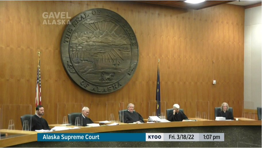The Alaska Supreme Court hears oral arguments in three appeals of a Superior Court judge's ruling on legal challenges to the new state legislative district map on March 18, 2022, in the court's chambers in Anchorage. Pictured, from left, are Justice Dario Borghesan, Senior Justice Warren Matthews Jr., Chief Justice Daniel Winfree, Senior Justice Robert Eastaugh and Justice Jennifer Henderson. (Gavel Alaska screen capture)