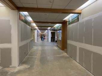 The halls of Riverbend Elementary School are just drywall and concrete after repairs due to a January flood.