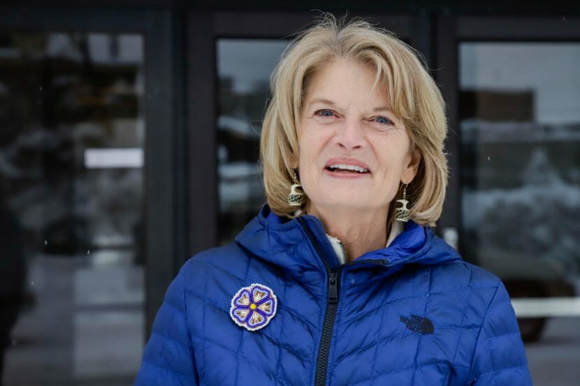 Lisa Murkowski standing outside in a blue jacket