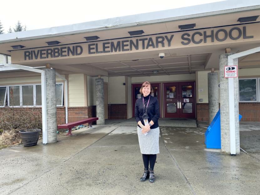 Riverbend Principal Elizabeth Pisel-Davis poses in front of the school on Feb. 28, 2022.