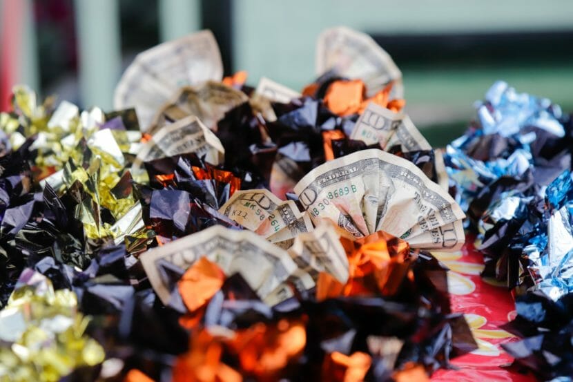 Candy leis with $10 bills attached