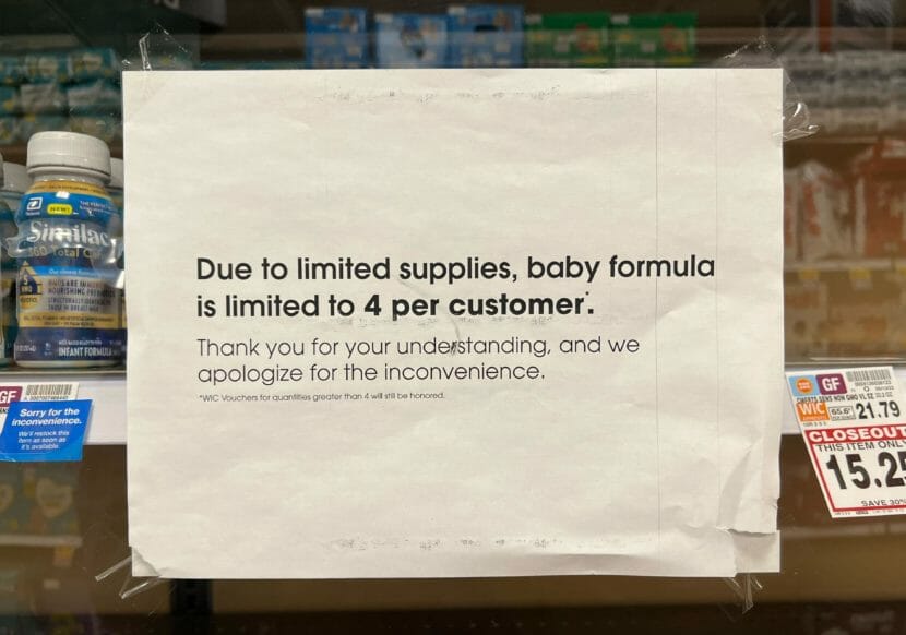 A sign telling customers they can buy no more than 4 packages of baby formula at once