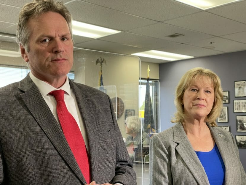 Gov. Dunleavy and Nancy Dahlstrom stand next to each other in an office