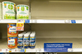 Mostly empty store shelves in the baby formula section