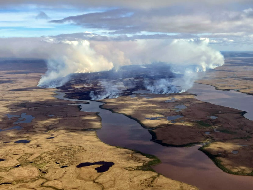 An aerial photo of smoking tundra
