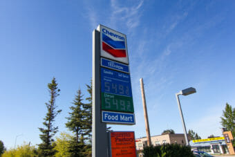 A Chevron sign advertising gas for 5.49 a gallon