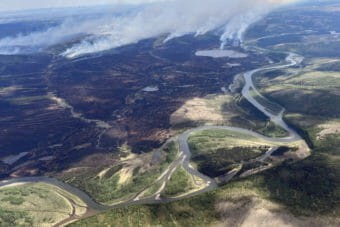 An aerial photo of a large tundra fire