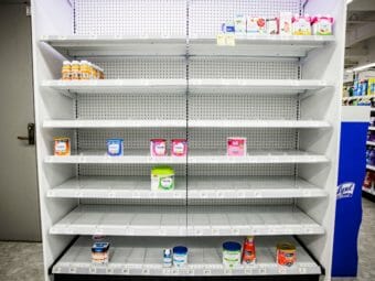 Shelves normally meant for baby formula sit nearly empty