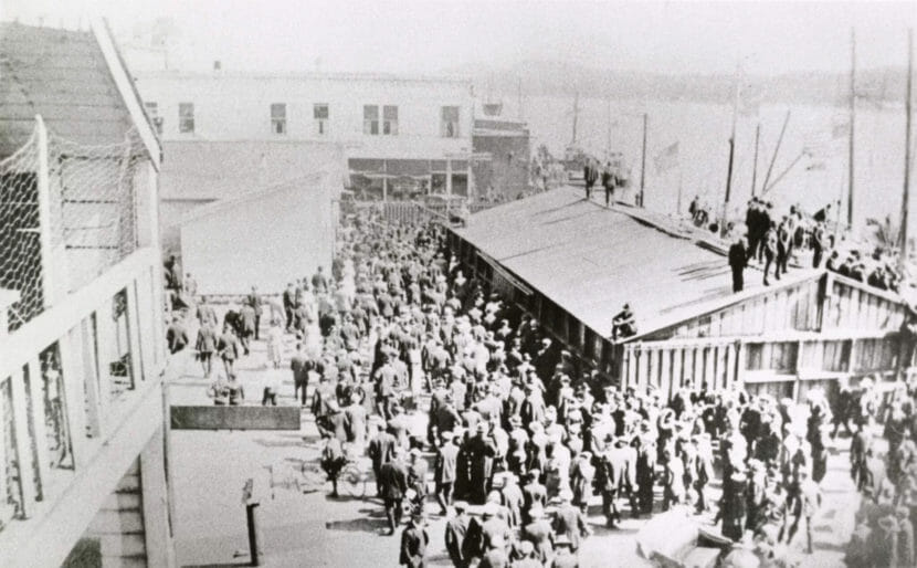 A black and white photo of a crowd in Ketchikan