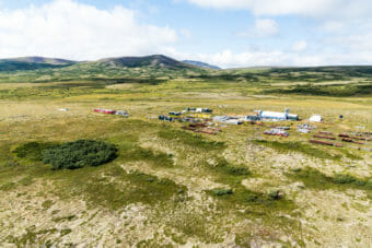 A field camp in mostly treeless wilderness