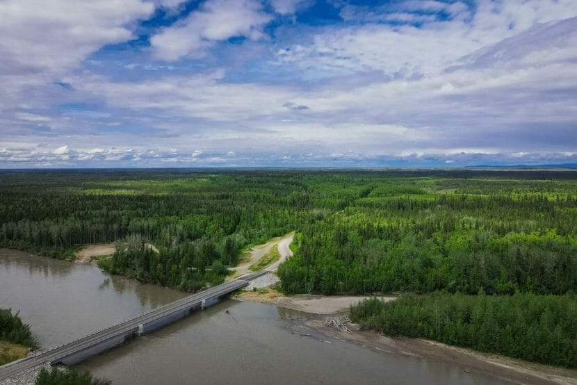 A view from above of the Nenana River bridge during summer