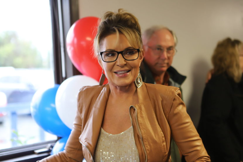Sarah Palin in front of some balloons