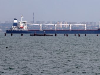 A large freight vessel in port
