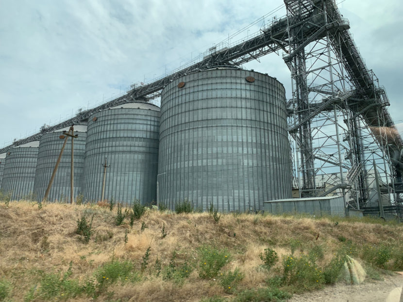 A row of metal grain silos