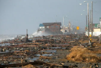 Front street in Nome, soaked and covered with debris