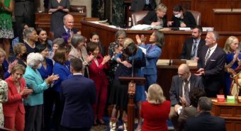 Lisa Murkowski hugs Mary Peltola on the House floor.